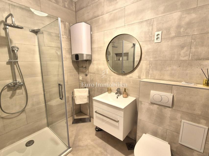 Appartamento arredato al piano terra con giardino