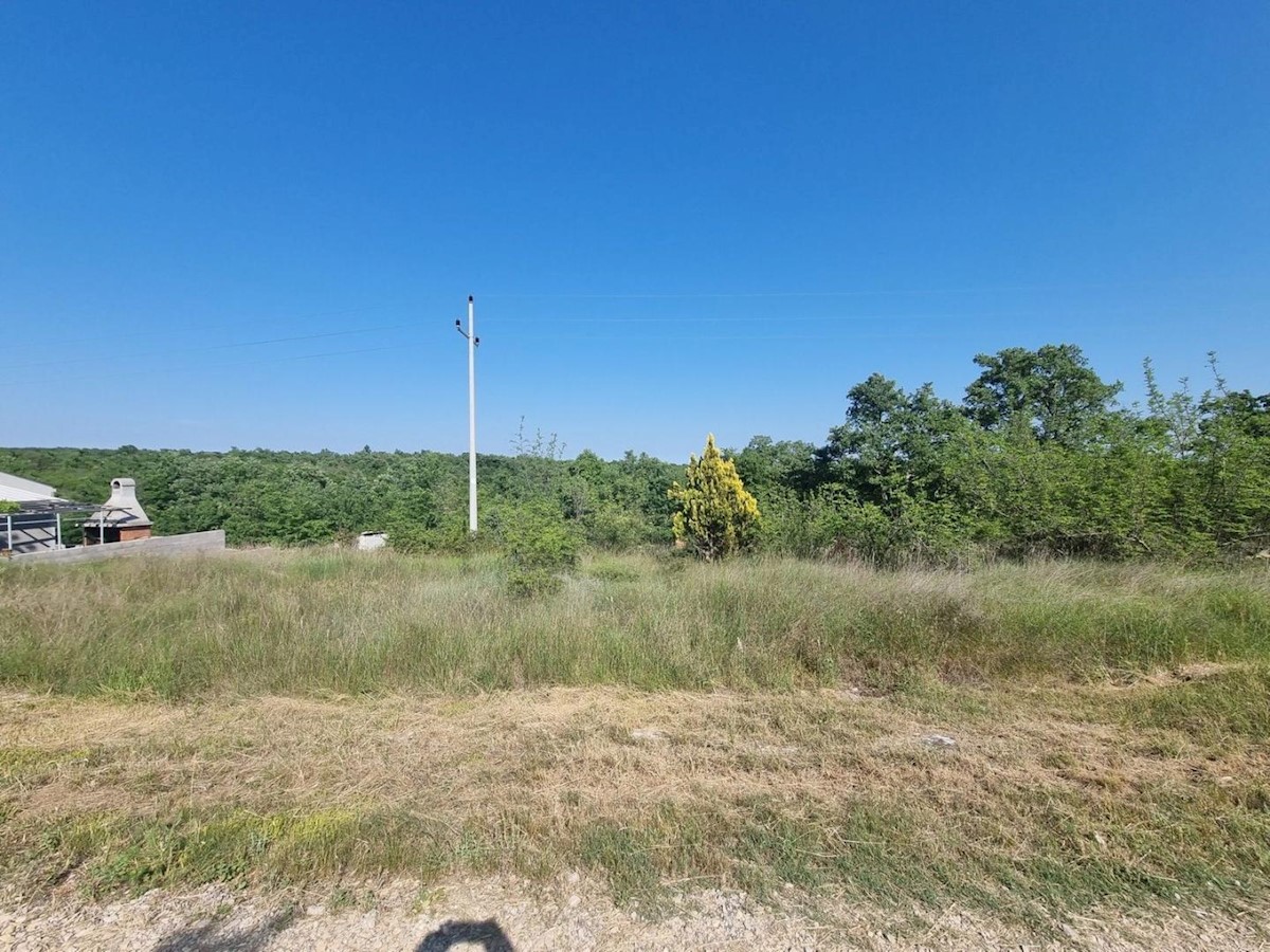 Land on the edge of the construction zone with a view of nature