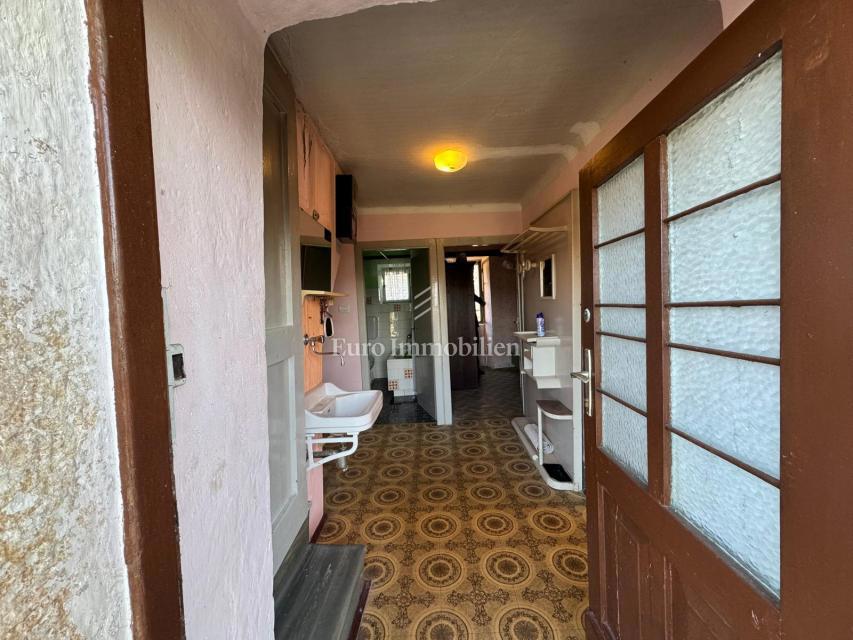 Labin - casa bifamiliare in pietra con potenziale