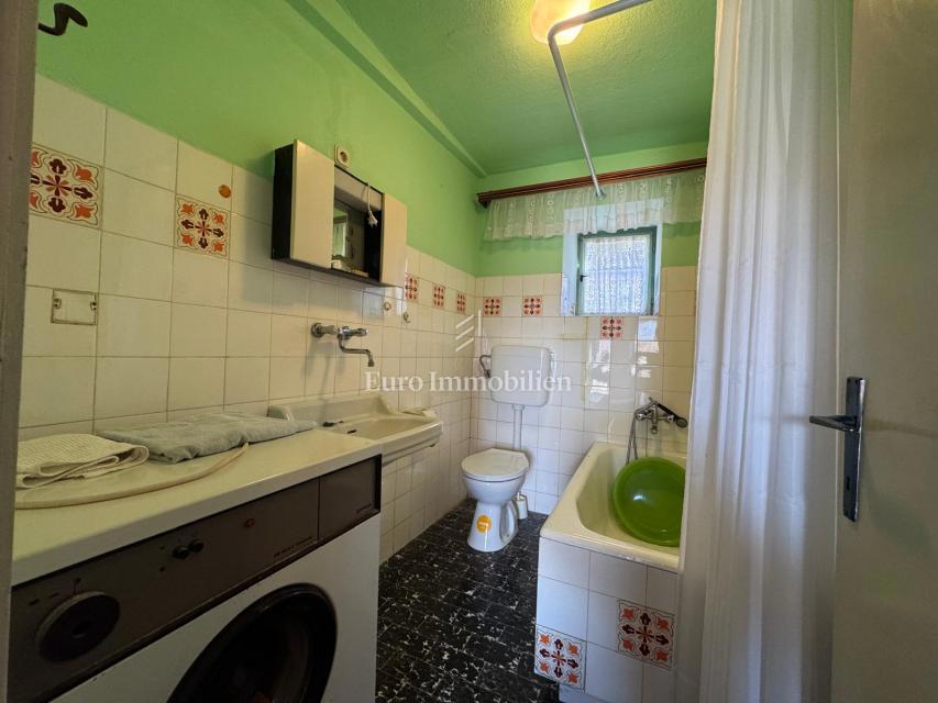 Labin - casa bifamiliare in pietra con potenziale