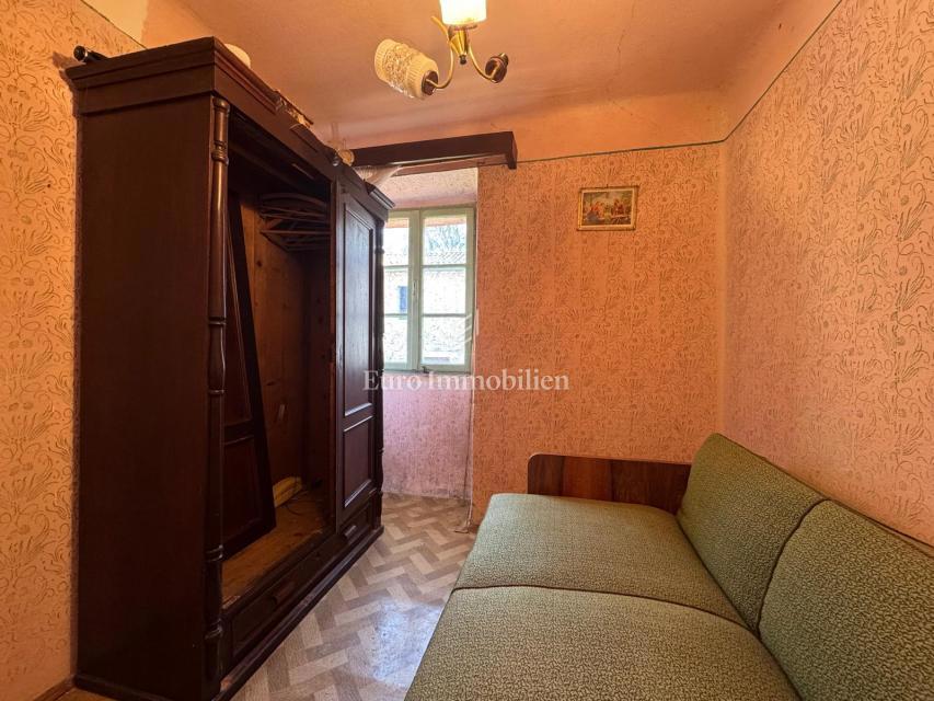 Labin - casa bifamiliare in pietra con potenziale