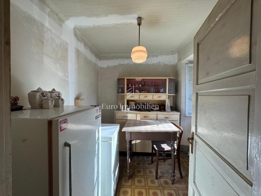 Labin - casa bifamiliare in pietra con potenziale