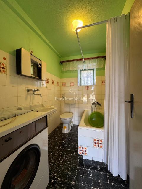 Labin - casa bifamiliare in pietra con potenziale