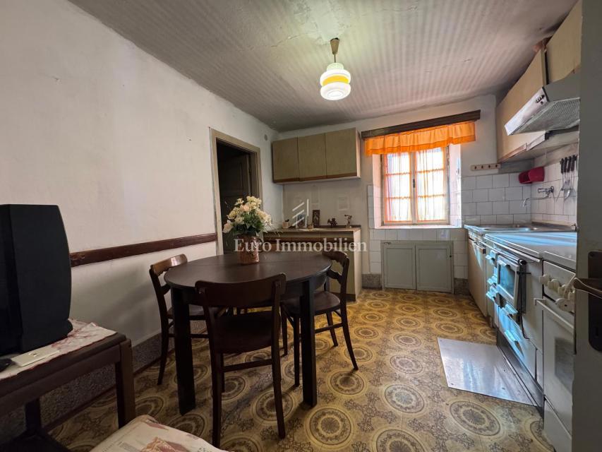 Labin - casa bifamiliare in pietra con potenziale