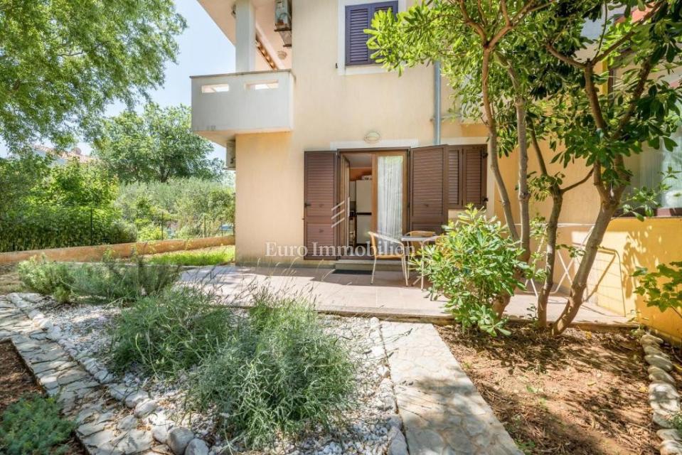 Ampio appartamento al piano terra con giardino curato