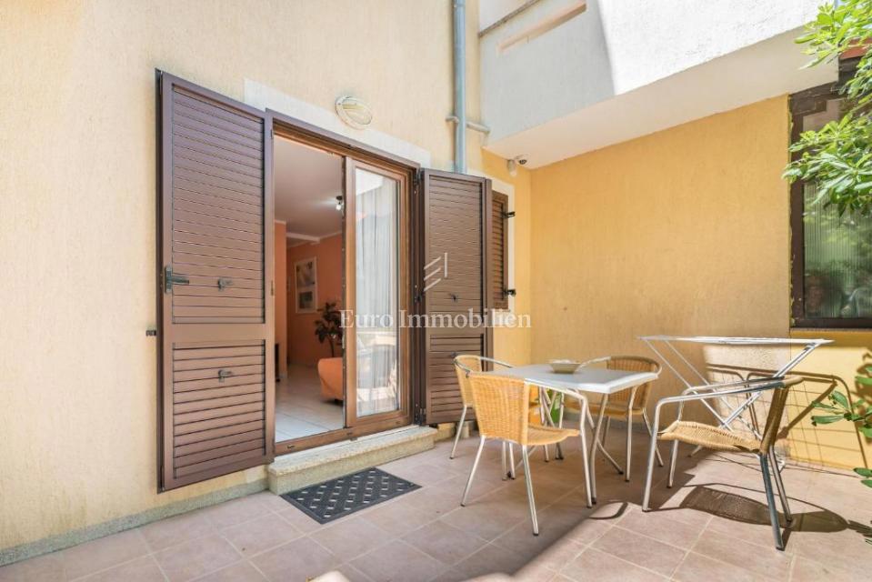 Ampio appartamento al piano terra con giardino curato