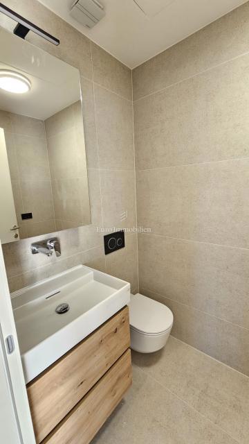 Attico di lusso con terrazza e 3 posti auto