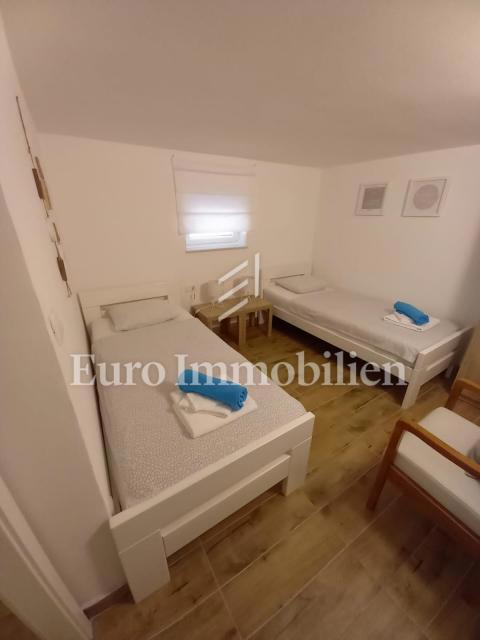 Nice semi-detached house with a pool, near the town of Krk