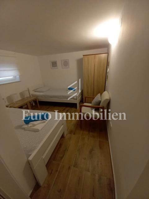 Nice semi-detached house with a pool, near the town of Krk