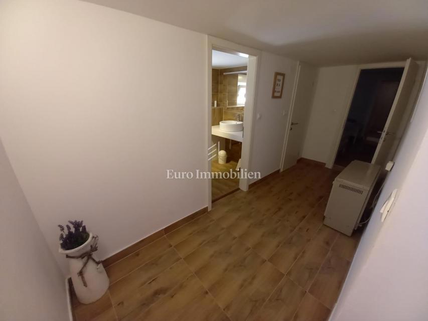 Nice semi-detached house with a pool, near the town of Krk