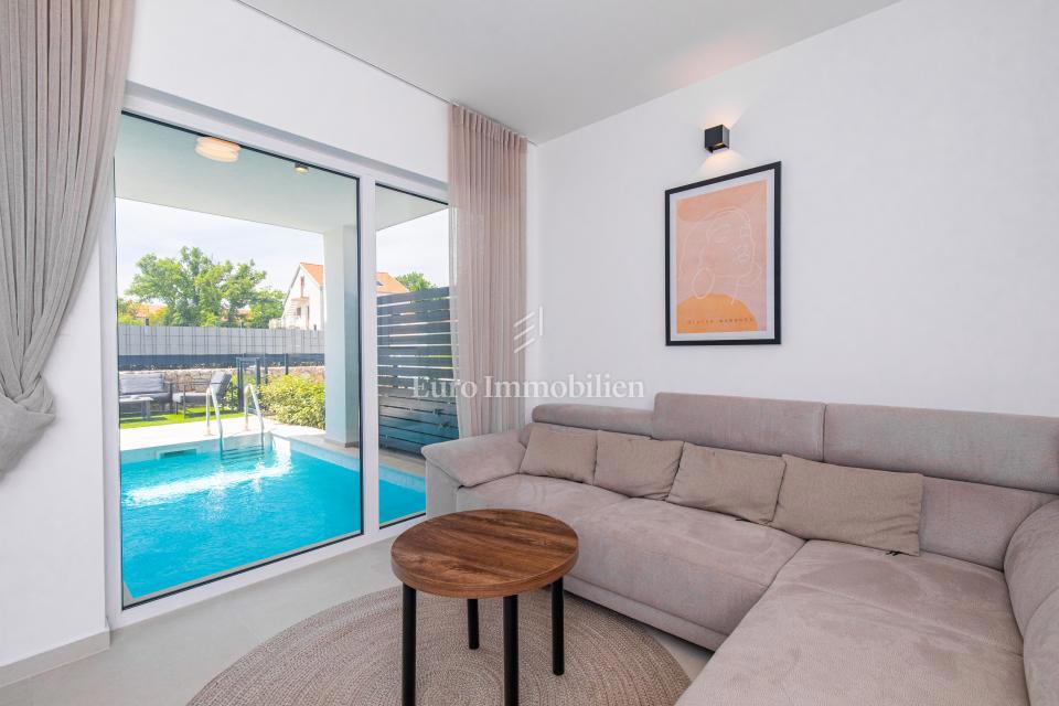 Appartamento con piscina e giardino