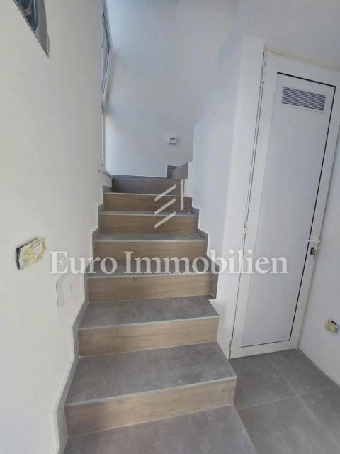 Modern two-story apartment with sea view in a good location, Tisno