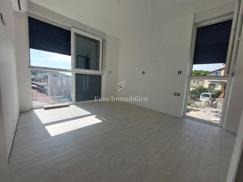 Modern two-story apartment with sea view in a good location, Tisno