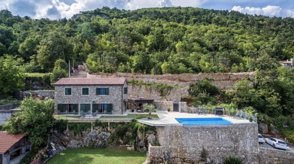 Modern stone villa with pool and panoramic sea views