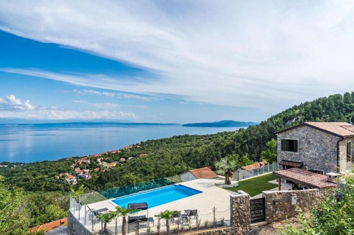 Modern stone villa with pool and panoramic sea views