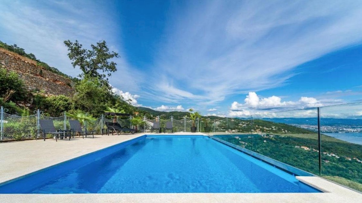 Modern stone villa with pool and panoramic sea views