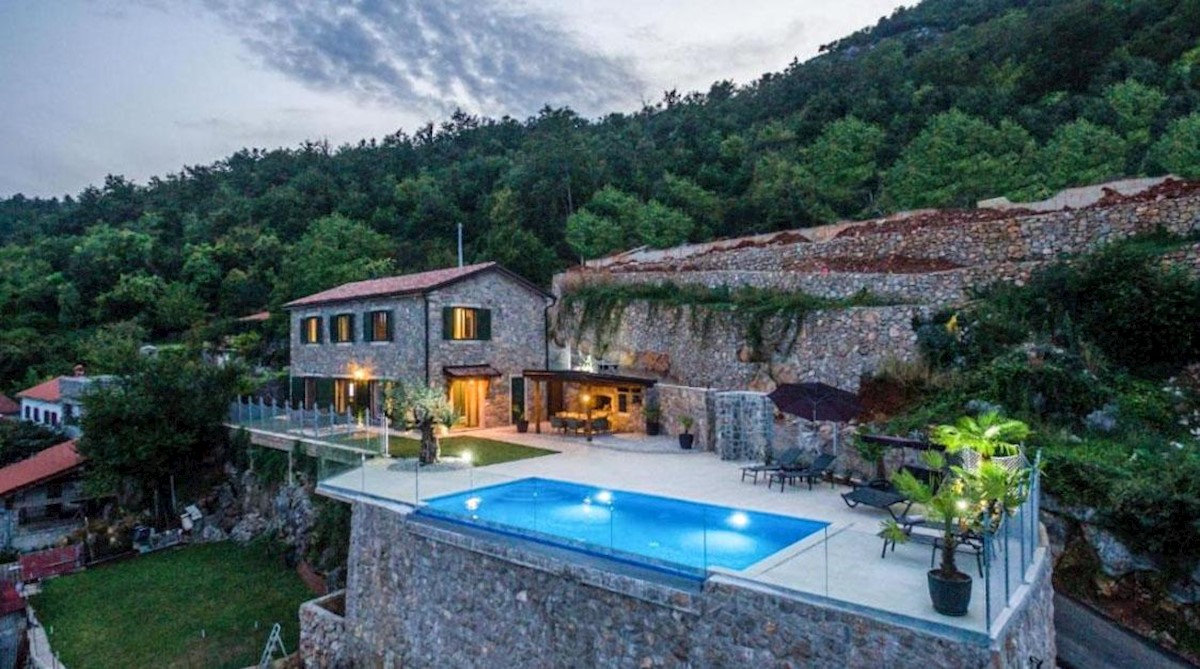 Modern stone villa with pool and panoramic sea views