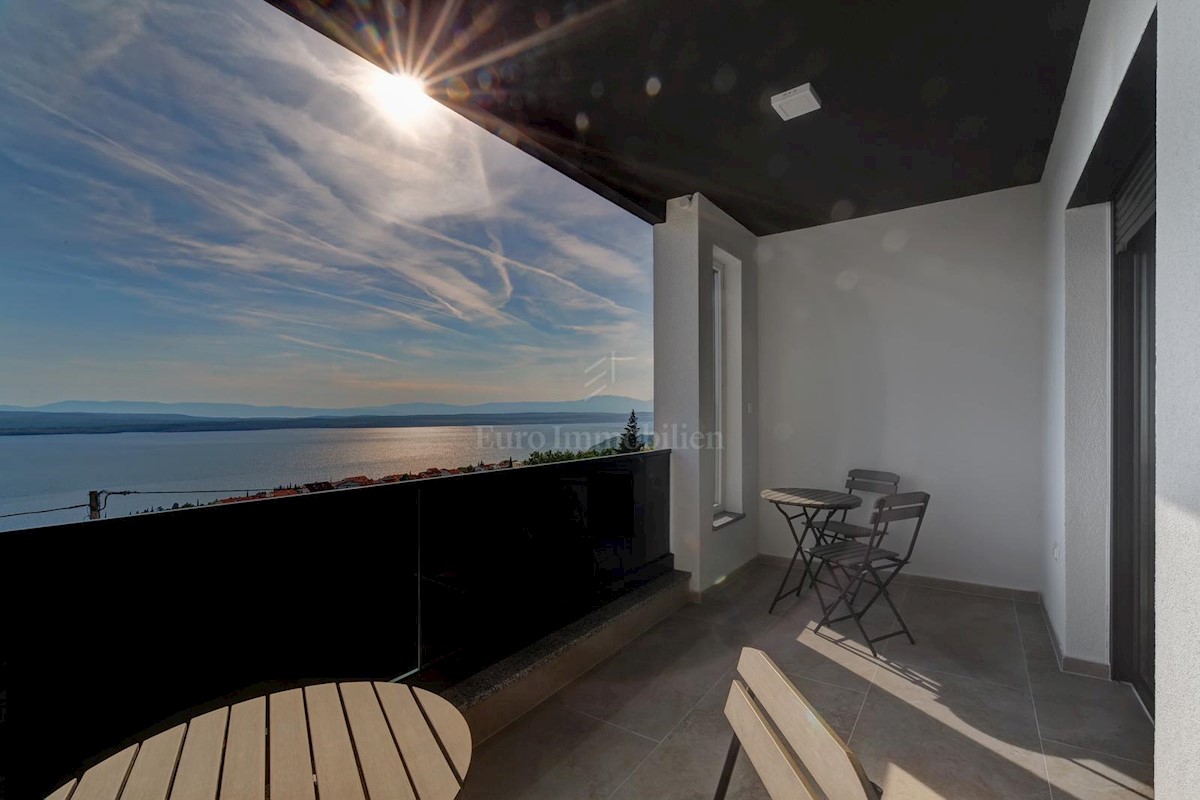 Modern house with a pool and a panoramic view of the sea