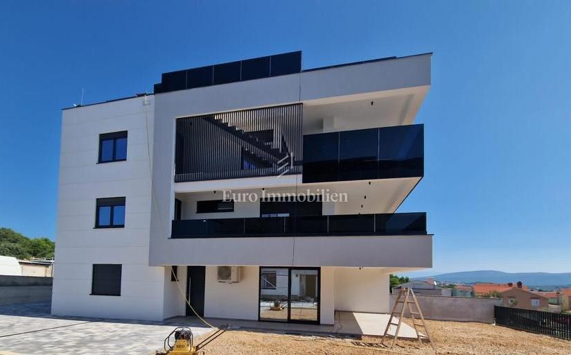 Modern apartment with garden, new building