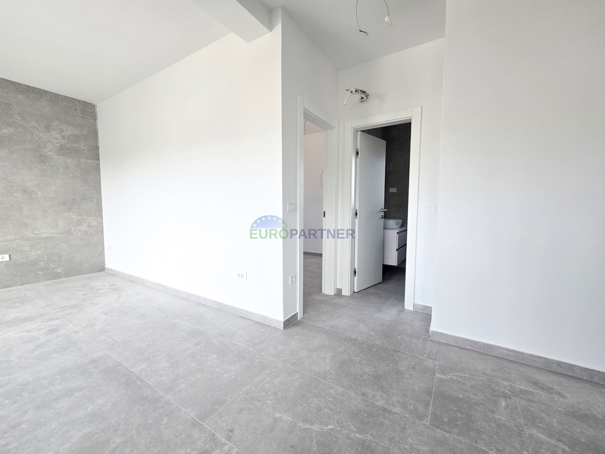Appartamento 65m2, nuova costruzione, zona Parenzo, Istria