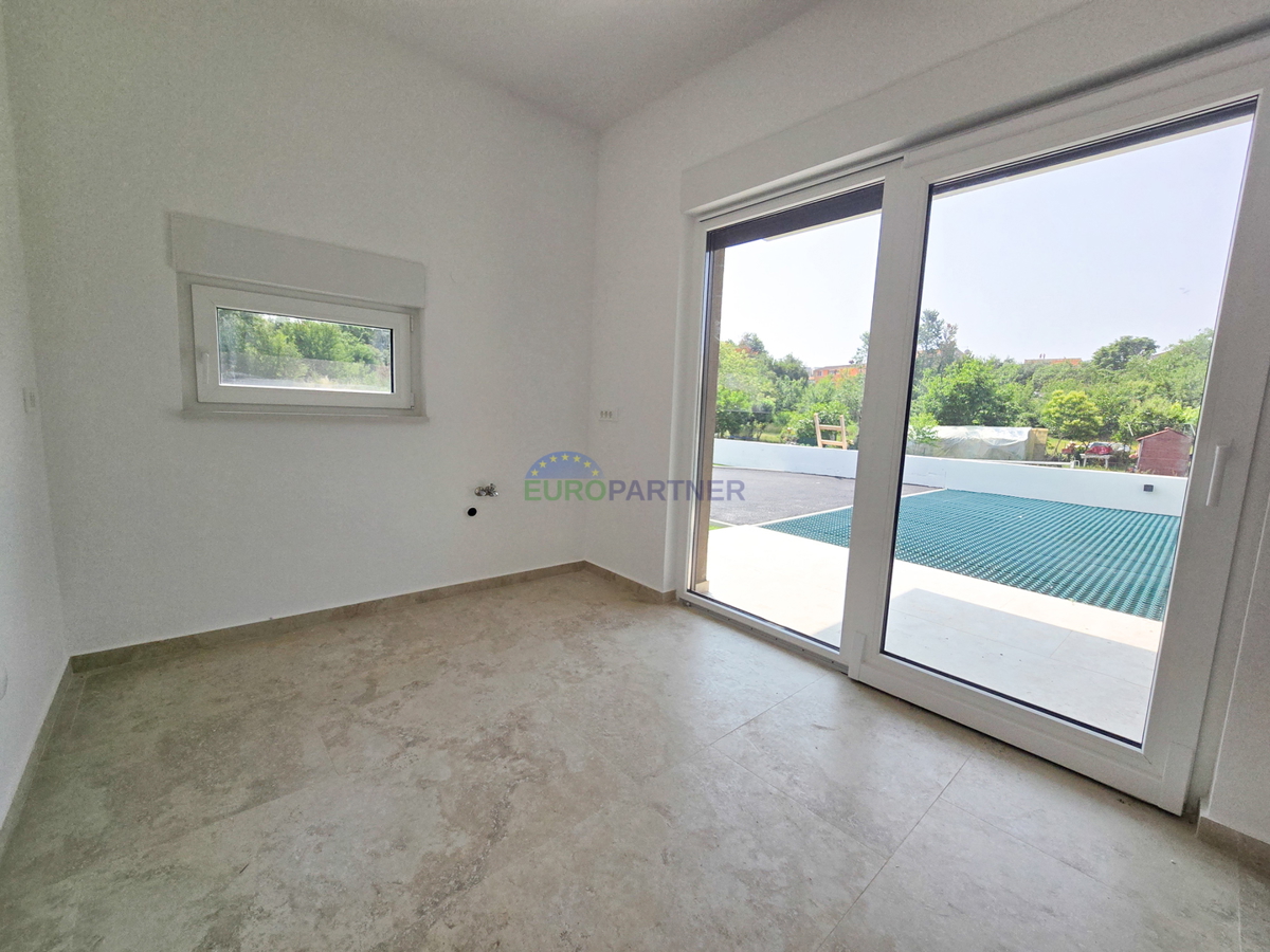 Appartamento al piano terra con giardino, zona Parenzo