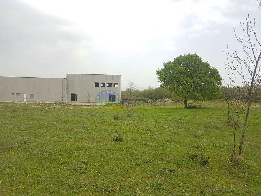 Terreno edificabile con capannone di produzione