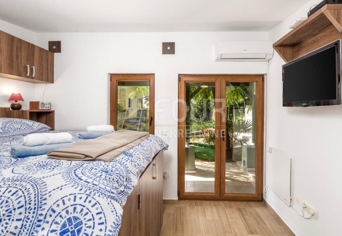 Opatija, casa - pianterreno con terrazza coperta e giardino