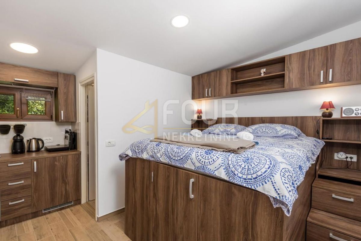 Opatija, casa - pianterreno con terrazza coperta e giardino