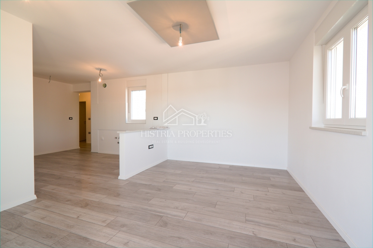 Un appartamento in un nuovo edificio vicino a Parenzo con possibilità di credito è un'opportunità ideale per risolvere il problema abitativo