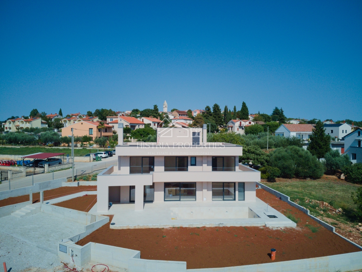 Moderna e confortevole villa con terrazza sul tetto, attrezzature di qualità e una vista unica