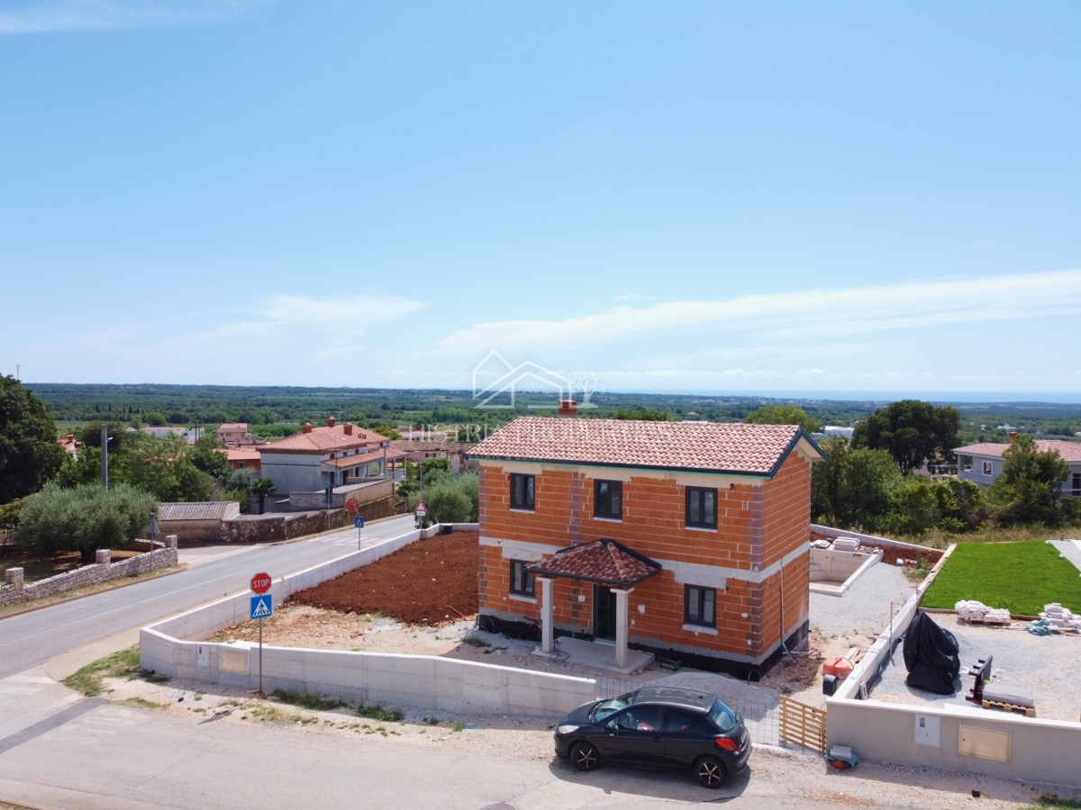 Casa con dettagli istriani riconoscibili e una splendida vista sul mare
