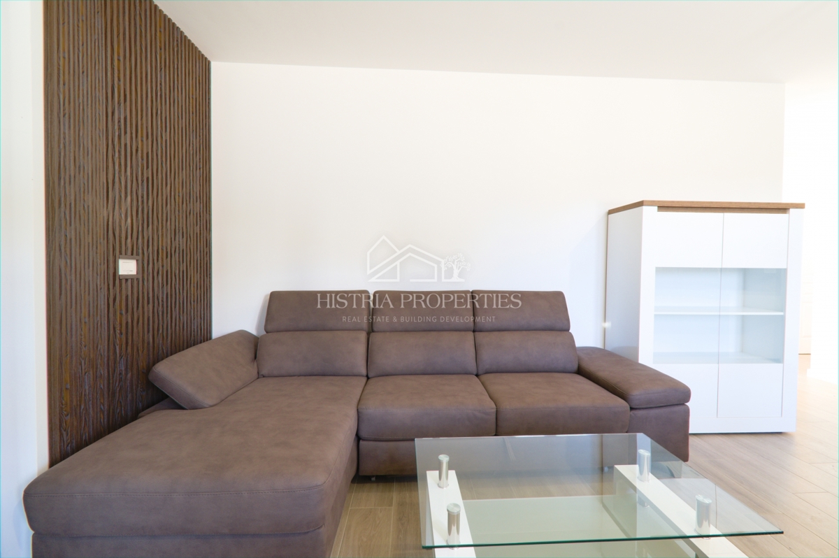 Appartamento arredato in un moderno edificio di nuova costruzione con giardino a 500 metri dalla spiaggia