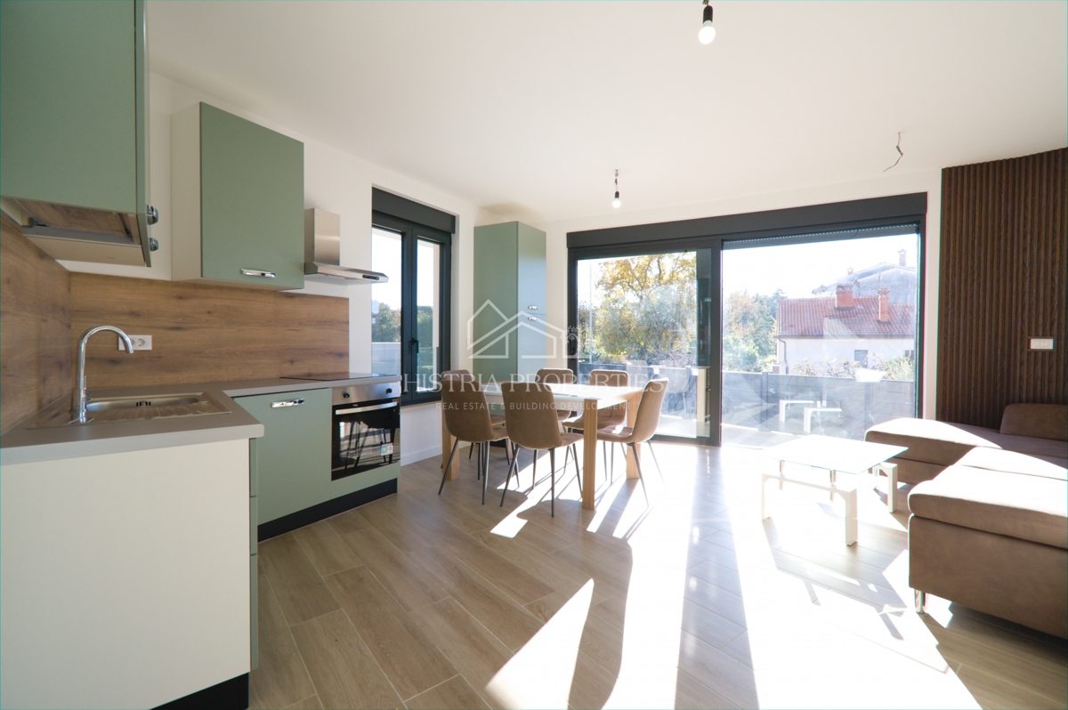 Appartamento arredato in un moderno edificio di nuova costruzione con giardino a 500 metri dalla spiaggia