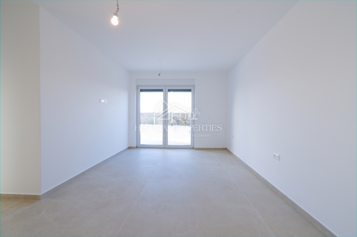 Attico con 2 ampie terrazze, ascensore interno all'appartamento e vista mare