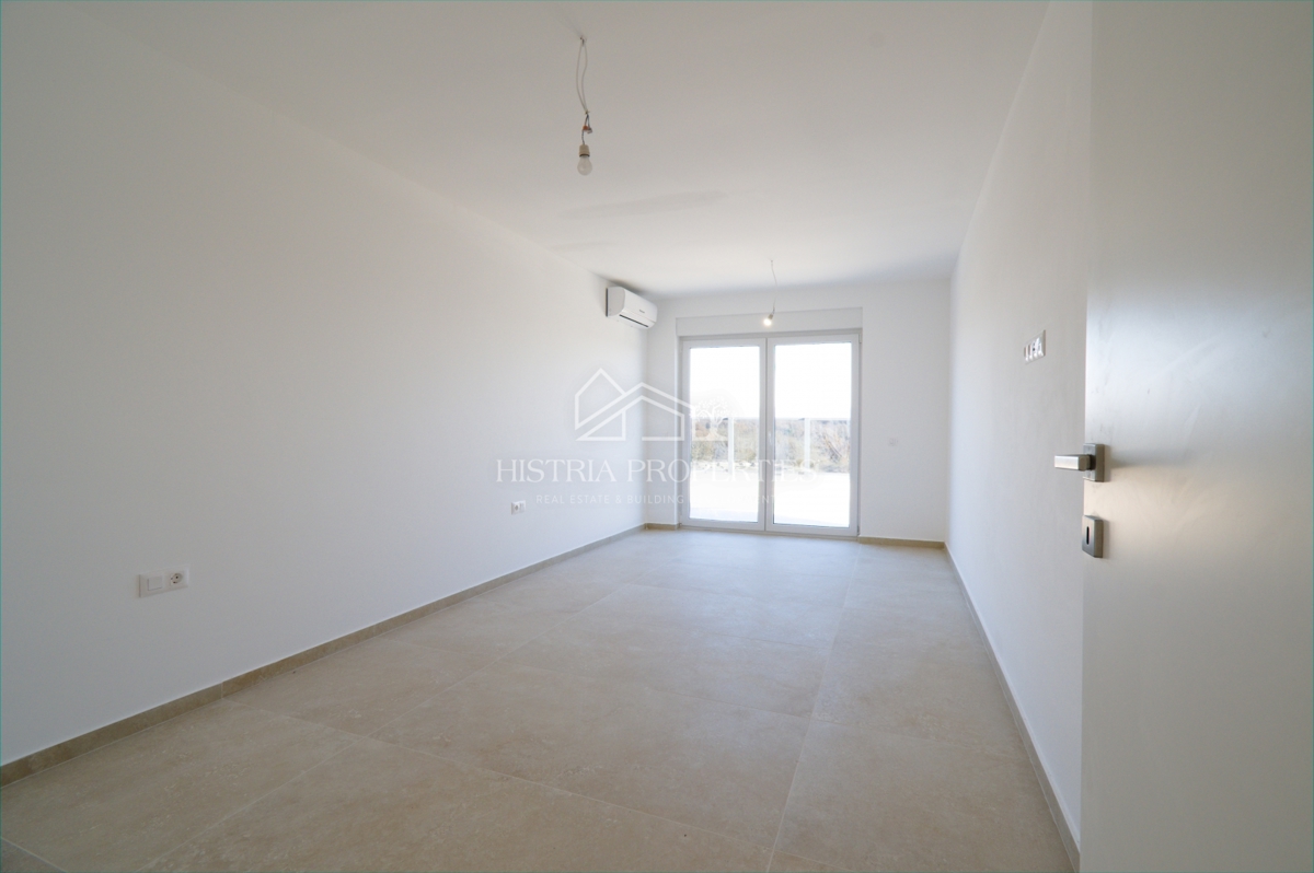 Attico con 2 ampie terrazze, ascensore interno all'appartamento e vista mare