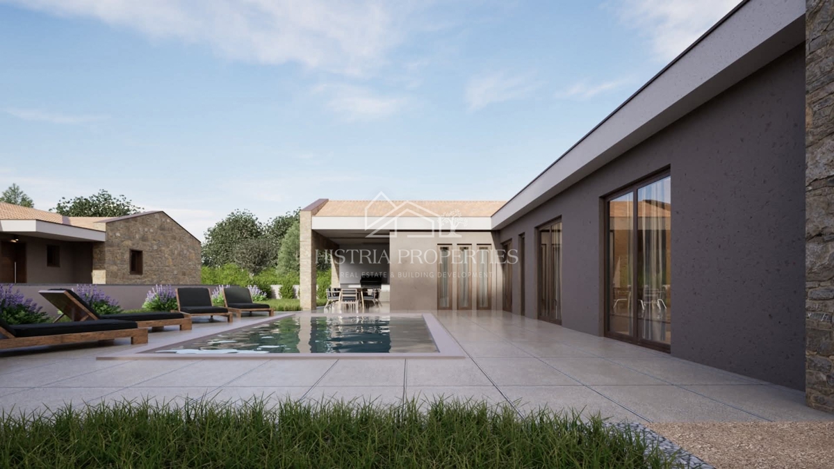 Una casa a un piano dal design moderno con piscina e servizi ausiliari