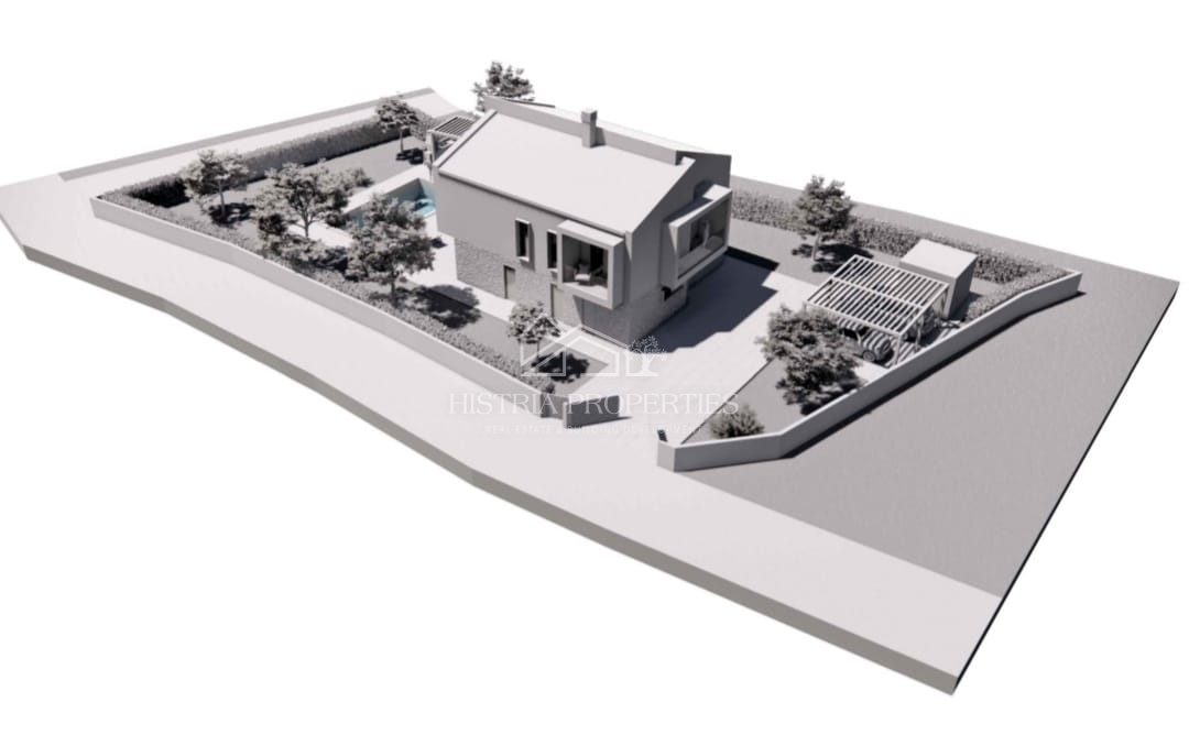 Terreno con permesso di costruire in un tranquillo villaggio istriano pronto per la costruzione