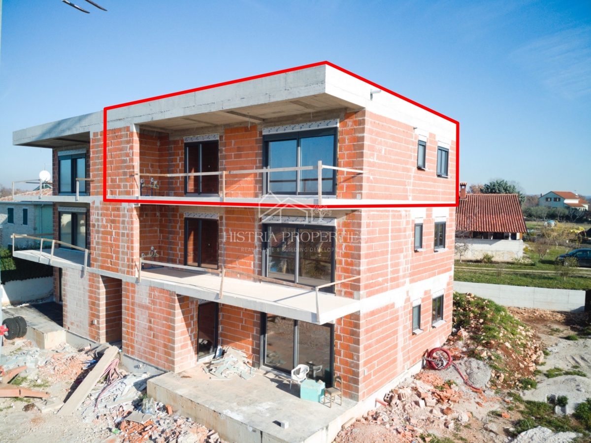 Nuova costruzione di qualità con vista mare e ampia terrazza in posizione tranquilla