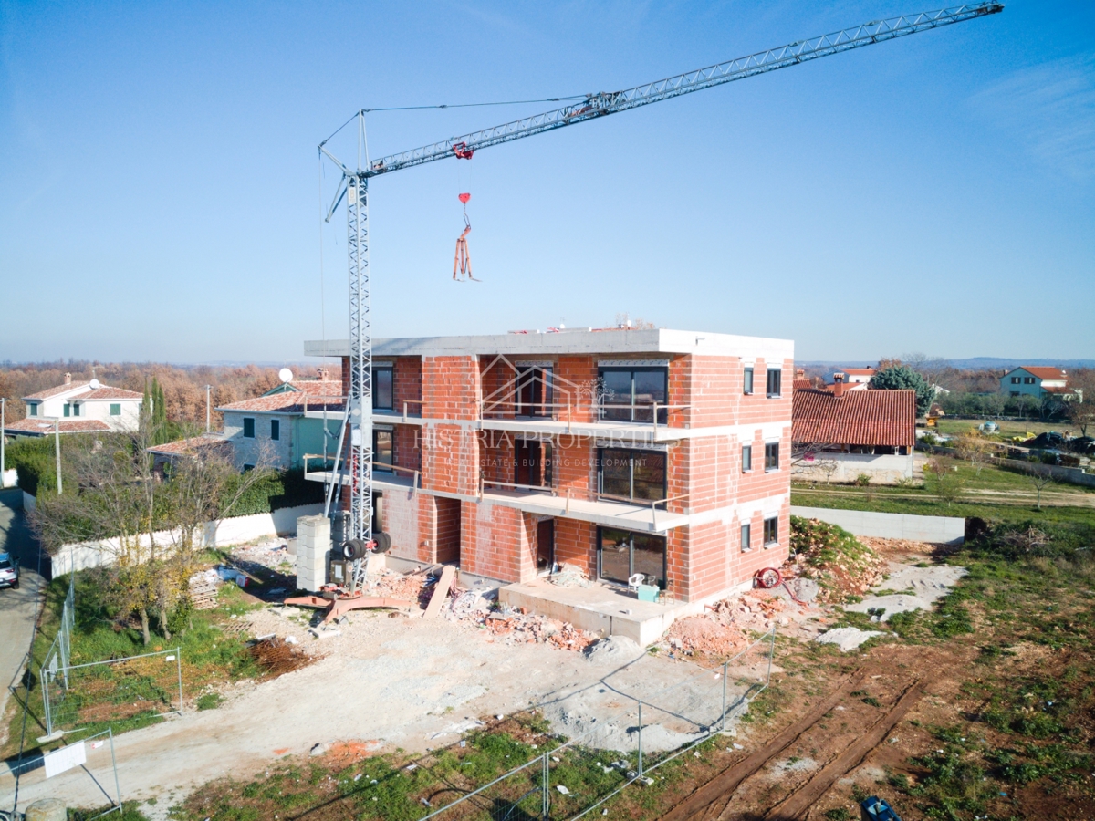 Nuova costruzione di qualità con vista mare e ampia terrazza in posizione tranquilla