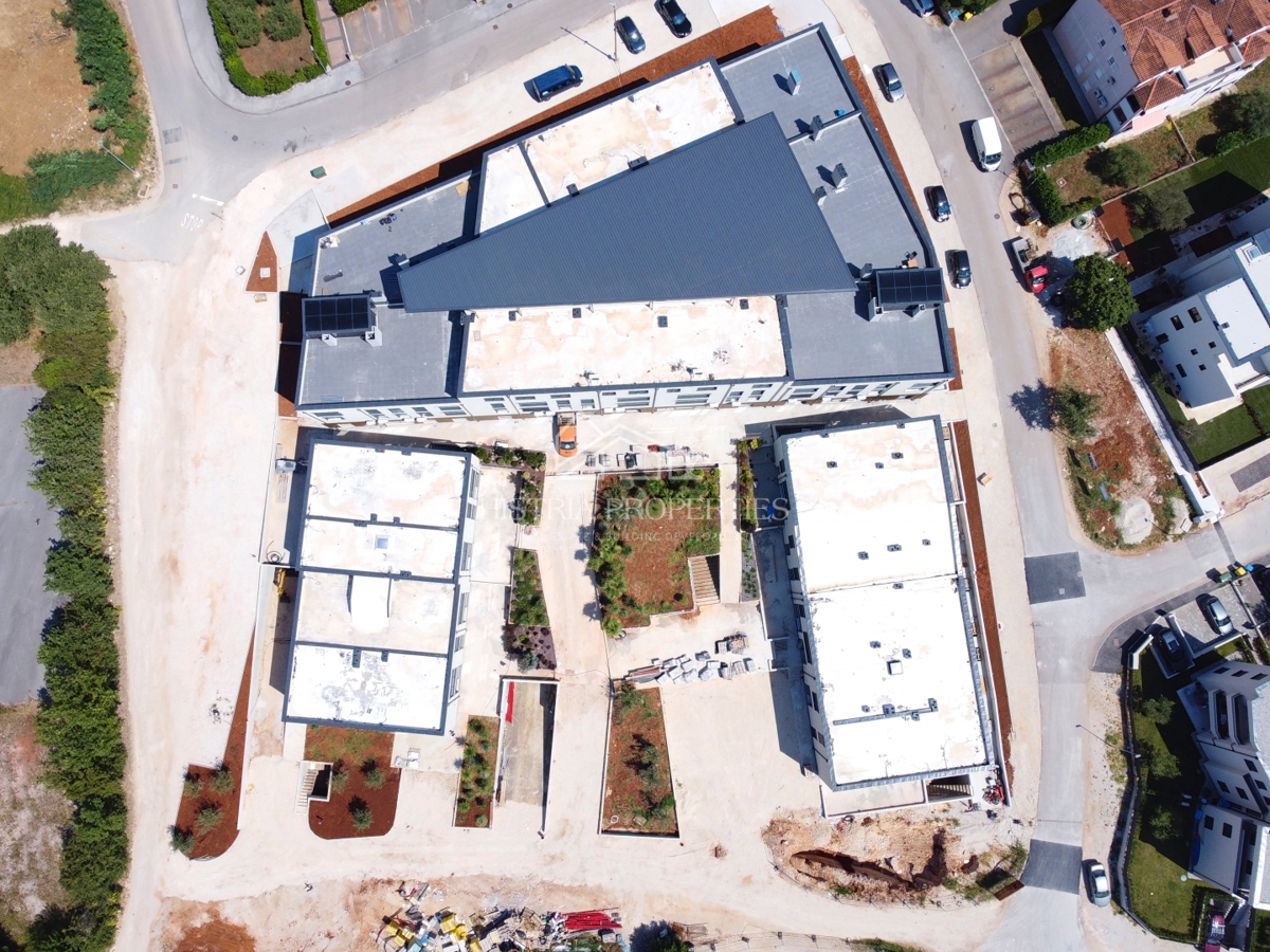 Appartamento con ascensore, piscina e garage in un lussuoso edificio di nuova costruzione