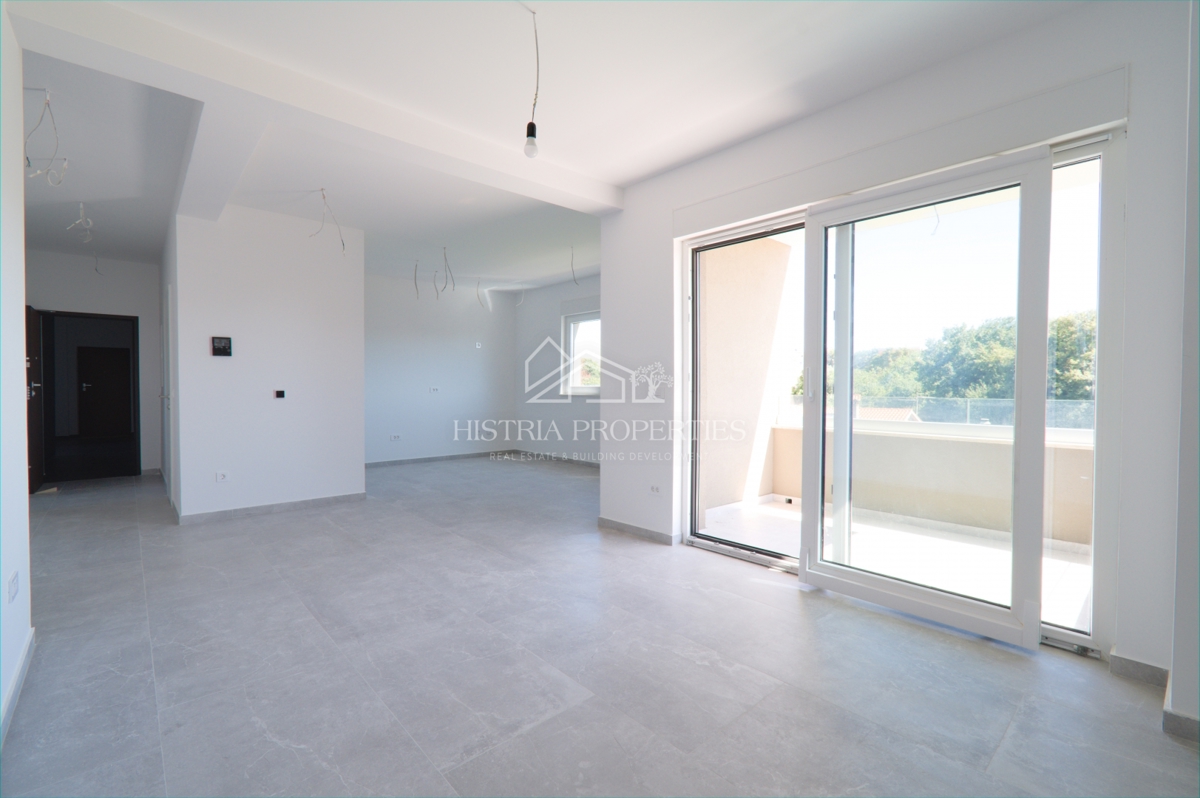 appartamento in un nuovo edificio con ascensore e terrazza con vista mare, pronto per essere abitato