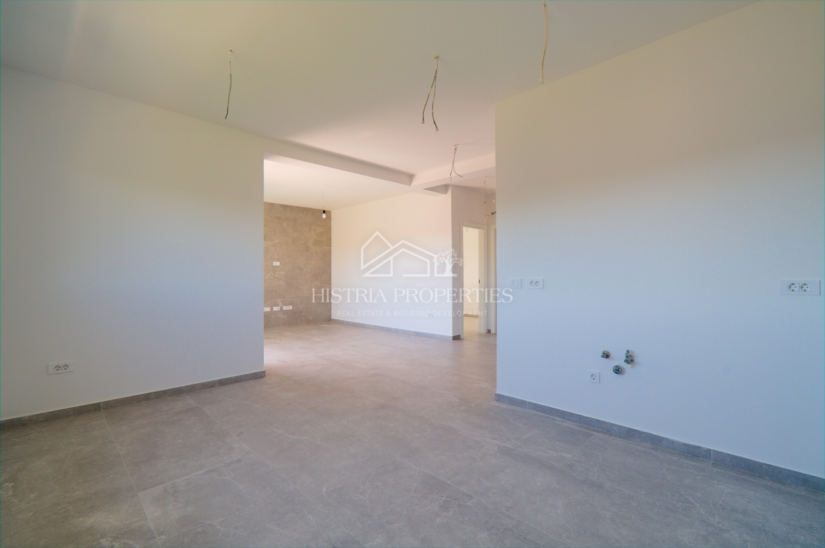 appartamento in un nuovo edificio con ascensore e terrazza con vista mare, pronto per essere abitato