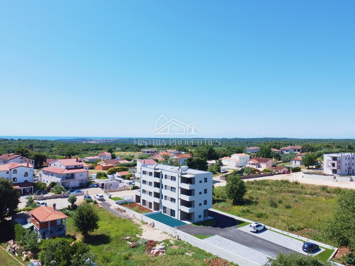 appartamento in un nuovo edificio con ascensore e terrazza con vista mare, pronto per essere abitato
