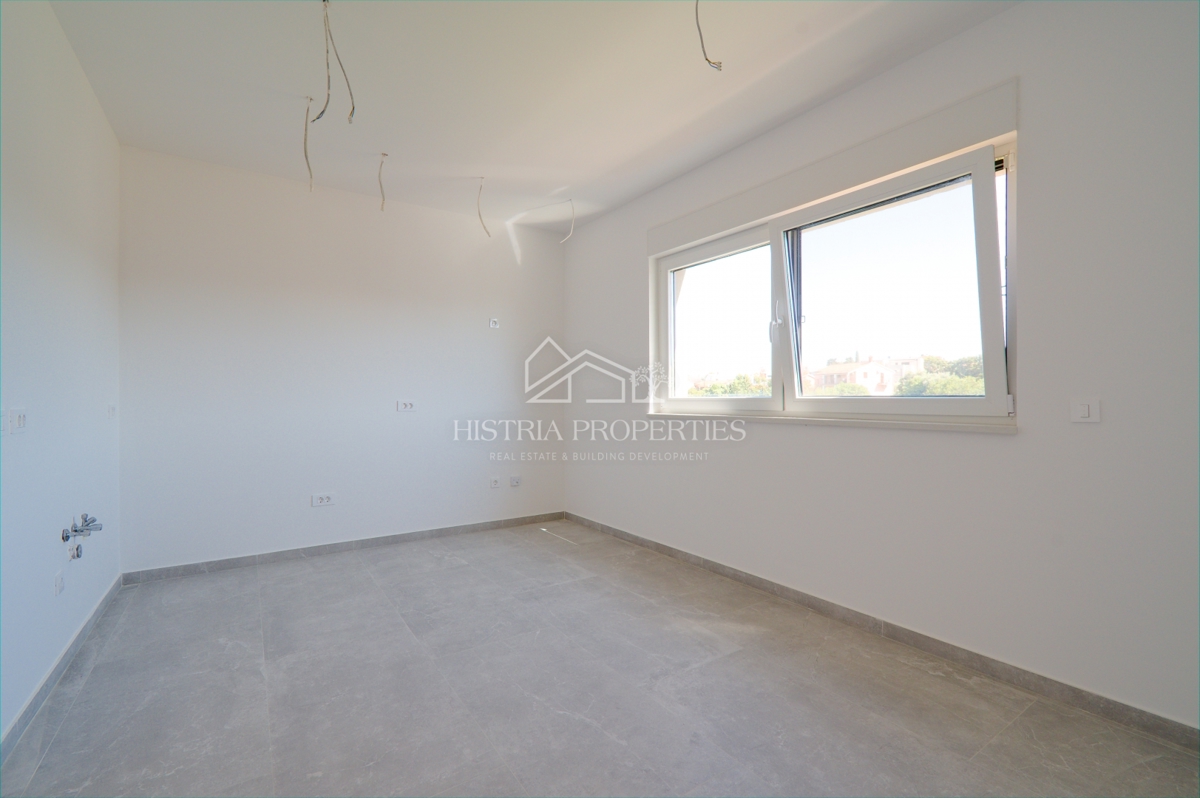 appartamento in un nuovo edificio con ascensore e terrazza con vista mare, pronto per essere abitato