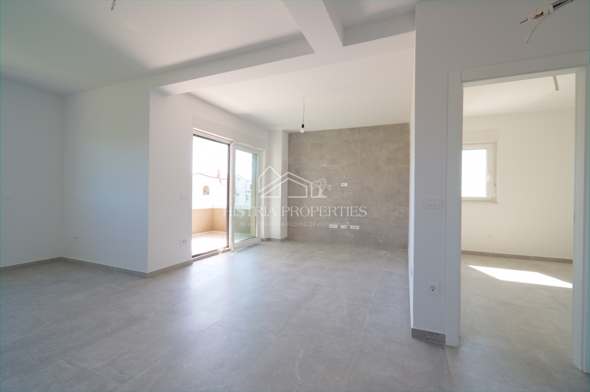 appartamento in un nuovo edificio con ascensore e terrazza con vista mare, pronto per essere abitato