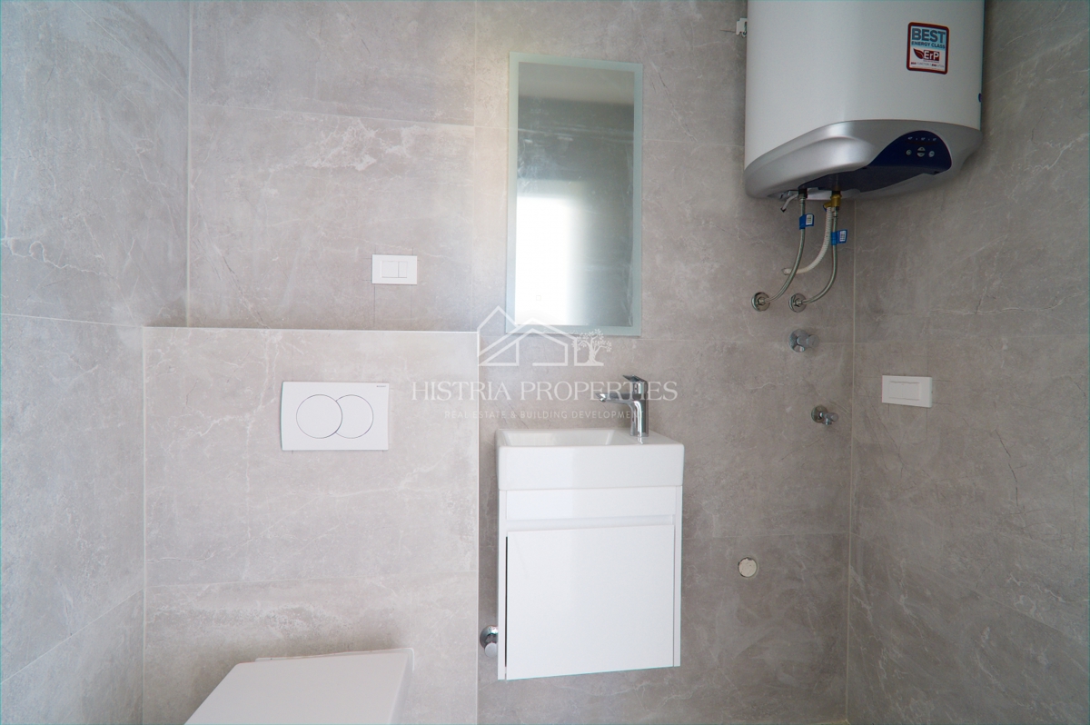 appartamento in un nuovo edificio con ascensore e terrazza con vista mare, pronto per essere abitato