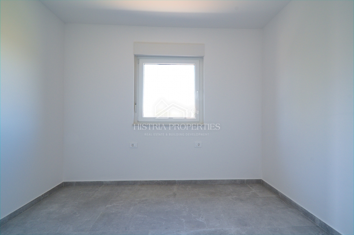 appartamento in un nuovo edificio con ascensore e terrazza con vista mare, pronto per essere abitato