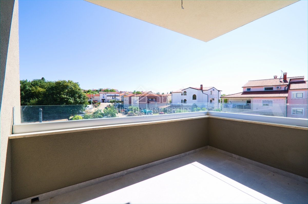 appartamento in un nuovo edificio con ascensore e terrazza con vista mare, pronto per essere abitato