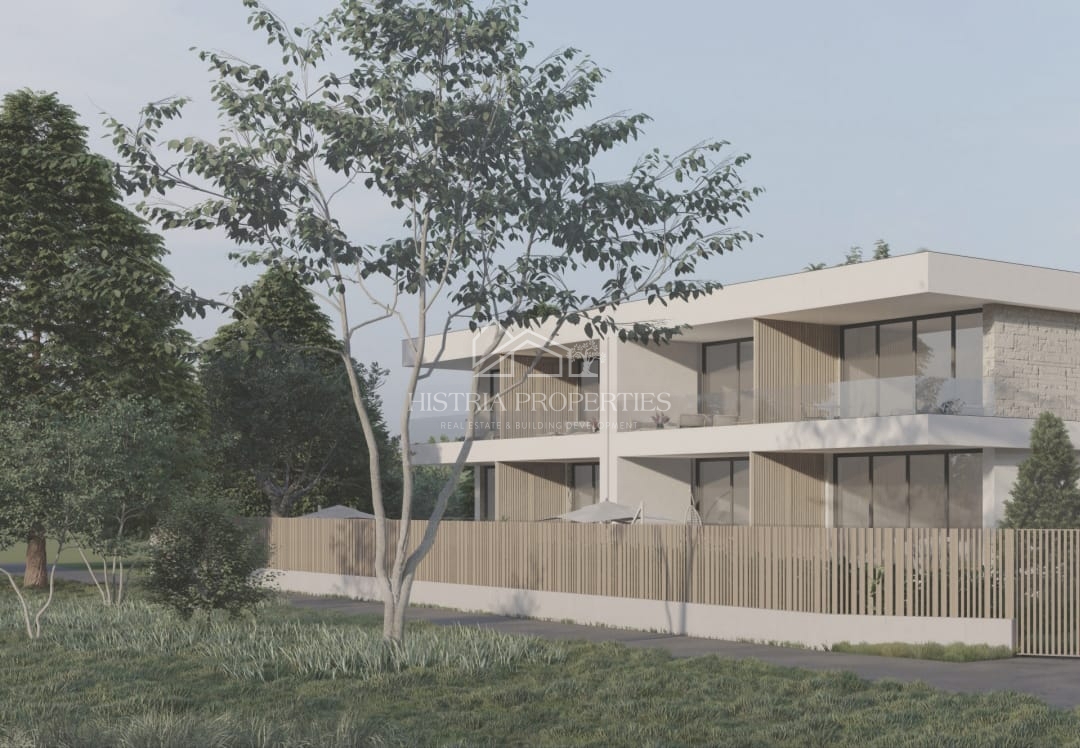 Qualità, buona posizione e appartamento con giardino in un nuovo edificio vicino a Rovigno