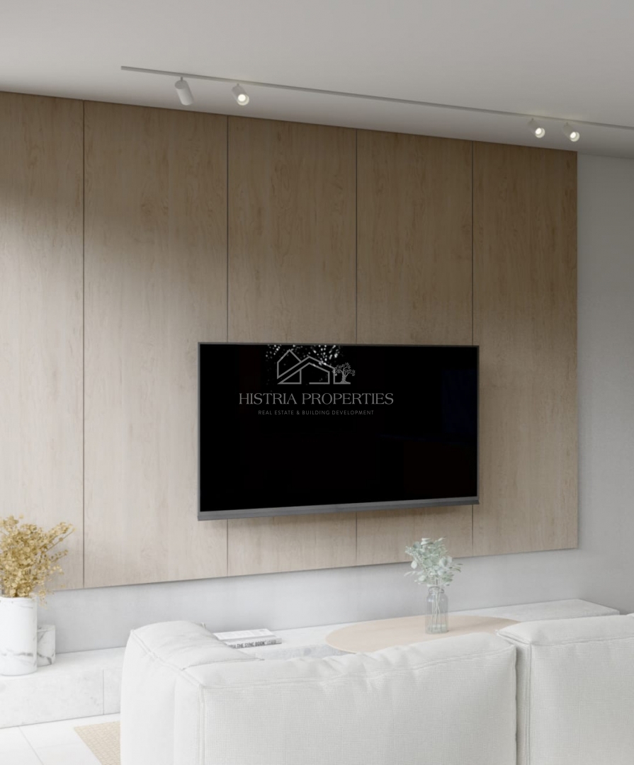 Qualità, buona posizione e appartamento con giardino in un nuovo edificio vicino a Rovigno